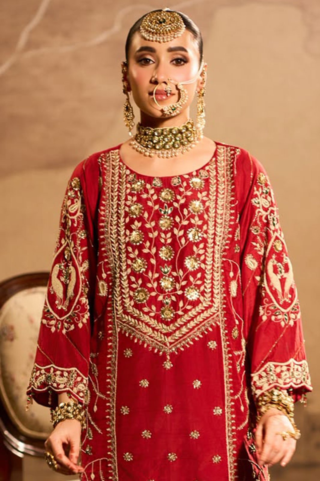 Classic red suit with a jadau choker set