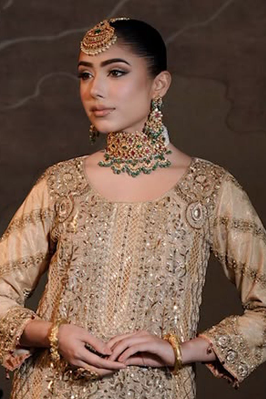 Champagne gharara with a kundan choker
